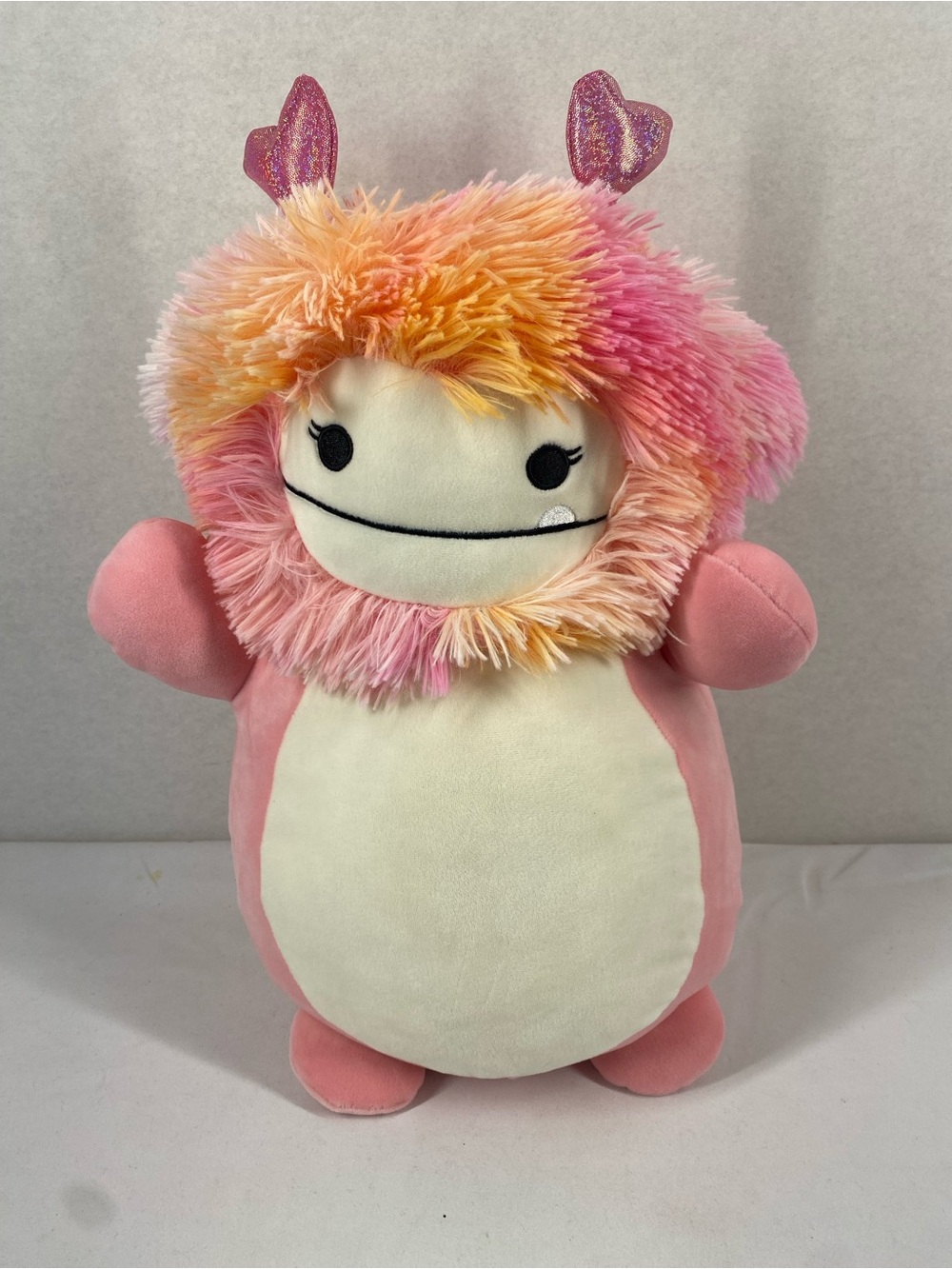 Squishmallows Hug Mees Soft Pink Plush Monster with Rainbow Fuzzy Mane